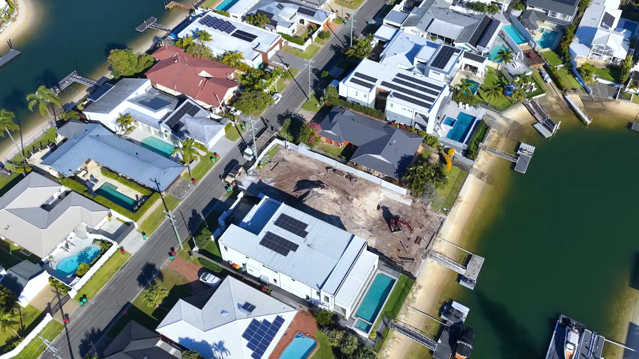 Aerial view of new homes and a cleared building site